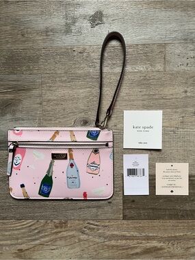 💕🎀👛Kate Spade Shore Street Tinie Wristlet Wallet Champagne Bottles Pink 2020